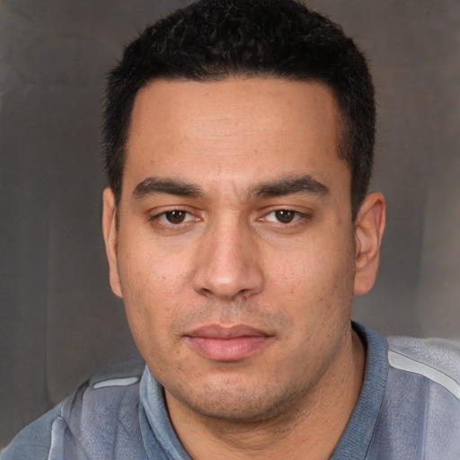 Neutral white young-adult male with short  black hair and brown eyes