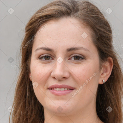 Joyful white young-adult female with long  brown hair and grey eyes