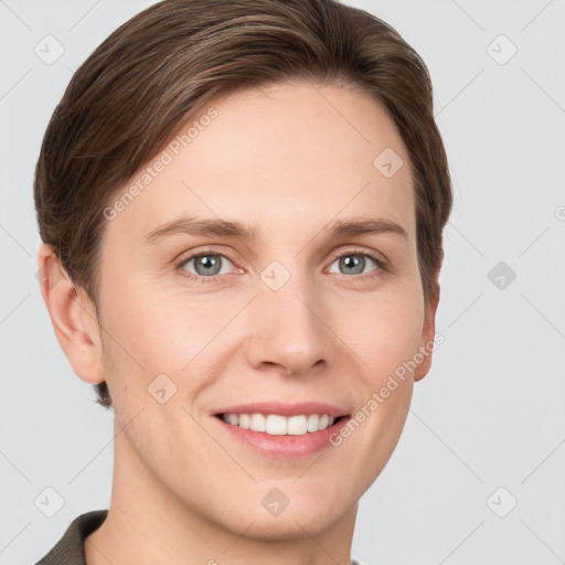 Joyful white young-adult female with short  brown hair and grey eyes