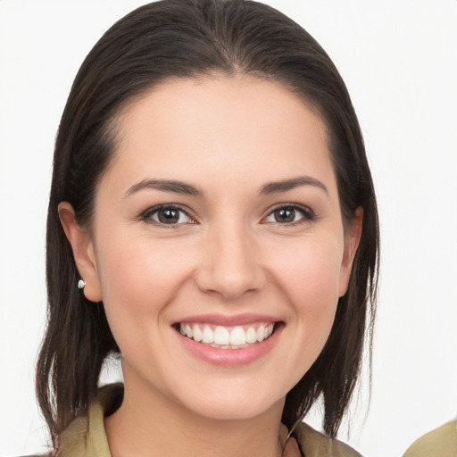 Joyful white young-adult female with medium  brown hair and brown eyes