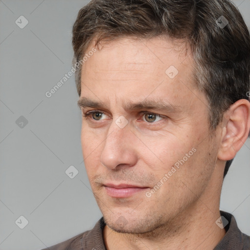 Neutral white adult male with short  brown hair and brown eyes