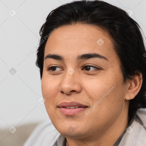 Joyful asian young-adult female with medium  black hair and brown eyes