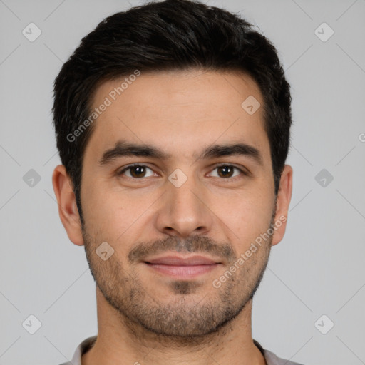 Joyful white young-adult male with short  black hair and brown eyes