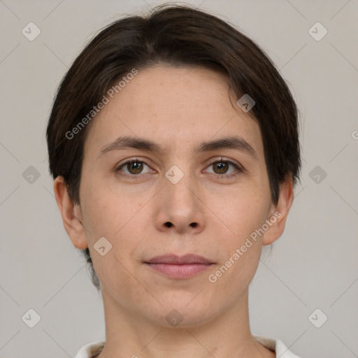 Joyful white young-adult female with short  brown hair and grey eyes