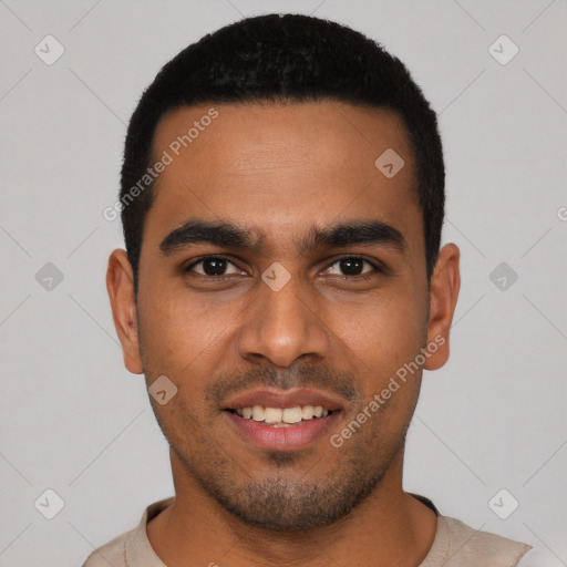 Joyful latino young-adult male with short  black hair and brown eyes
