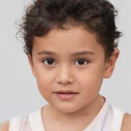 Joyful white child male with short  brown hair and brown eyes