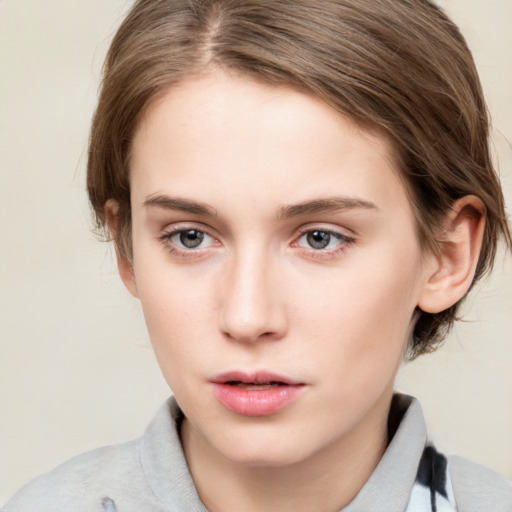 Neutral white young-adult female with medium  brown hair and grey eyes