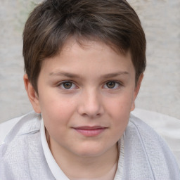 Joyful white child female with short  brown hair and brown eyes