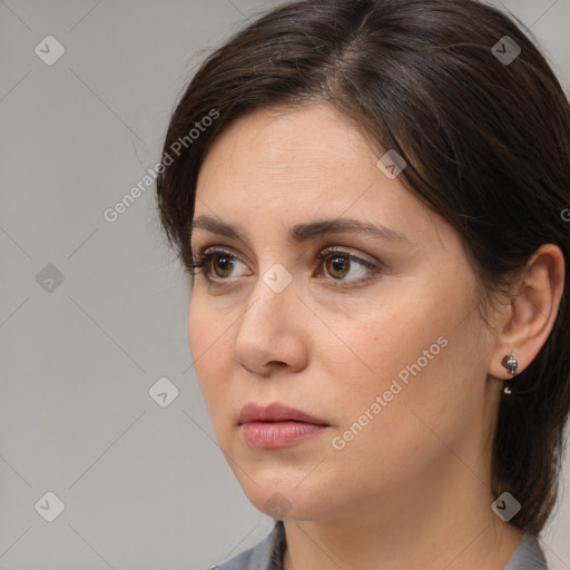 Neutral white young-adult female with medium  brown hair and brown eyes