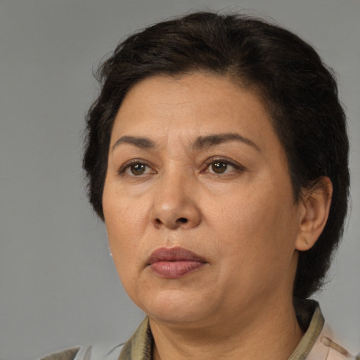 Neutral white adult female with short  brown hair and brown eyes