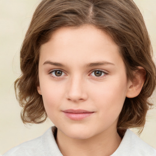 Joyful white child female with medium  brown hair and brown eyes