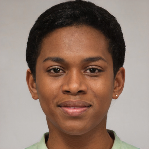 Joyful latino young-adult female with short  black hair and brown eyes