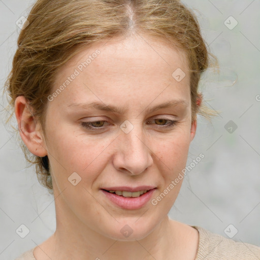 Joyful white young-adult female with medium  brown hair and blue eyes