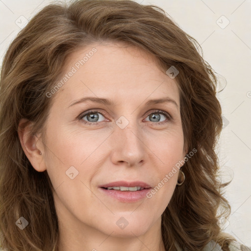 Joyful white young-adult female with long  brown hair and blue eyes