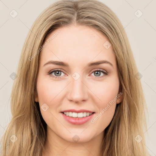 Joyful white young-adult female with long  brown hair and green eyes