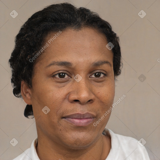 Joyful latino adult female with short  brown hair and brown eyes