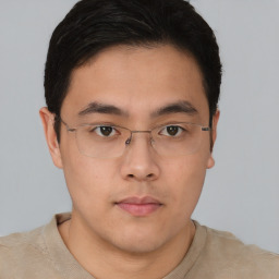 Neutral asian young-adult male with short  brown hair and brown eyes