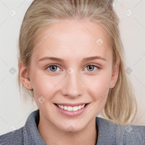 Joyful white young-adult female with medium  brown hair and blue eyes