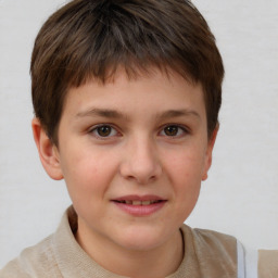 Joyful white child male with short  brown hair and brown eyes