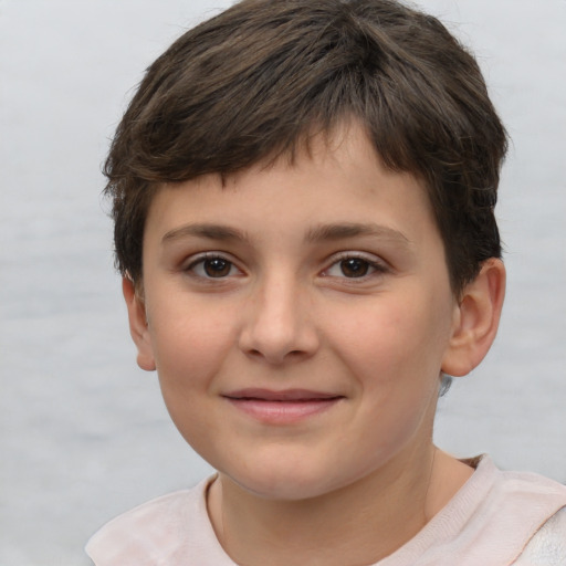 Joyful white child female with short  brown hair and brown eyes