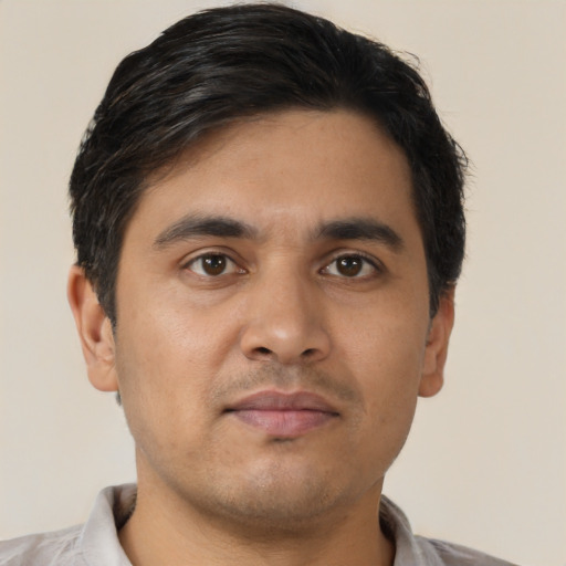 Neutral asian young-adult male with short  brown hair and brown eyes