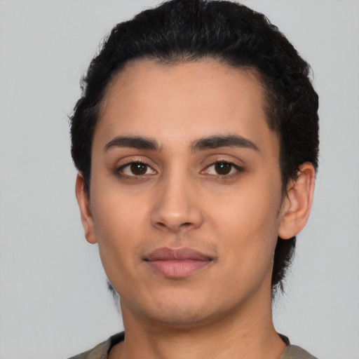 Neutral latino young-adult male with short  black hair and brown eyes