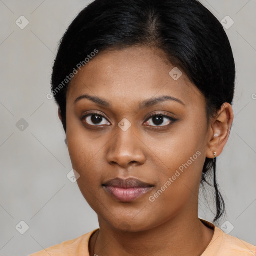 Neutral black young-adult female with medium  black hair and brown eyes