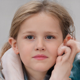 Neutral white child female with medium  brown hair and blue eyes