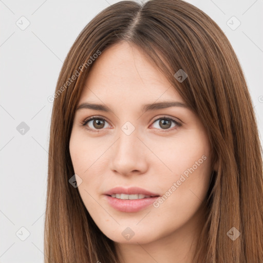 Neutral white young-adult female with long  brown hair and brown eyes