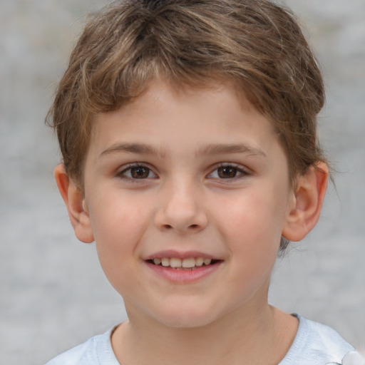 Joyful white child male with short  brown hair and brown eyes