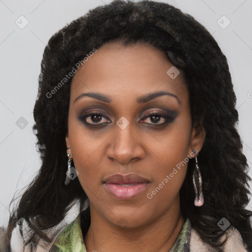 Joyful black young-adult female with long  black hair and brown eyes