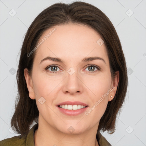 Joyful white young-adult female with medium  brown hair and grey eyes