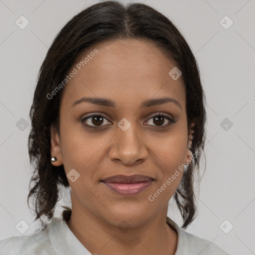 Joyful black young-adult female with medium  brown hair and brown eyes