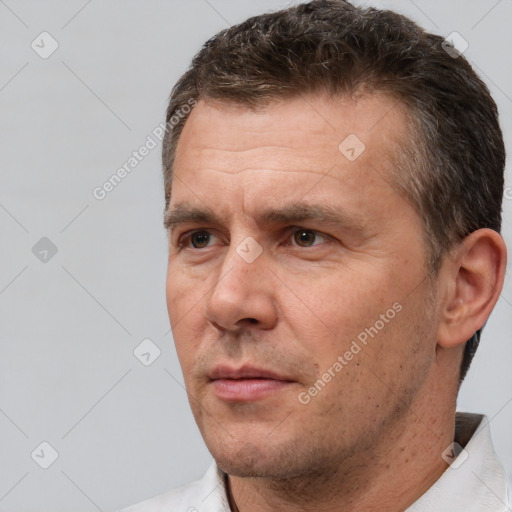 Neutral white adult male with short  brown hair and brown eyes