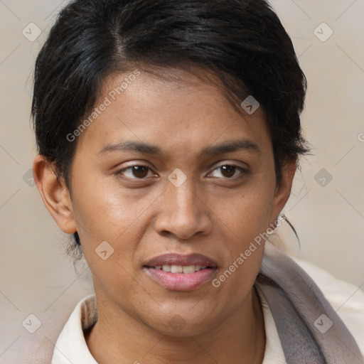 Joyful black adult female with short  brown hair and brown eyes