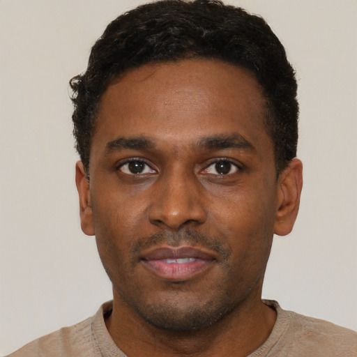 Neutral black young-adult male with short  black hair and brown eyes