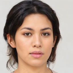 Neutral asian young-adult female with medium  brown hair and brown eyes