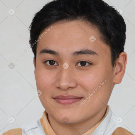 Joyful asian young-adult female with short  brown hair and brown eyes