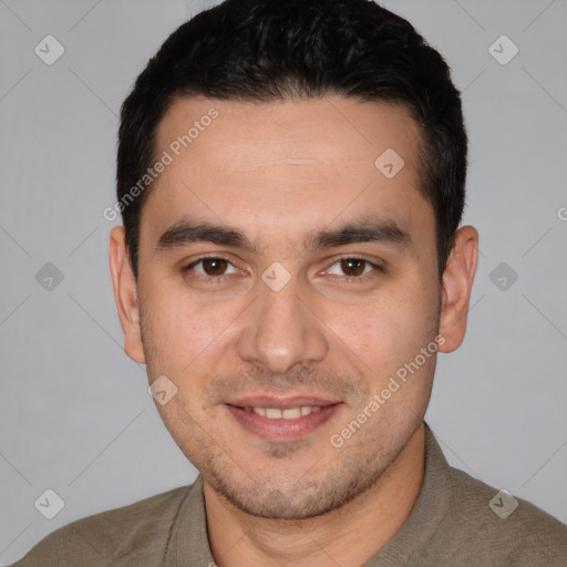 Joyful white young-adult male with short  black hair and brown eyes