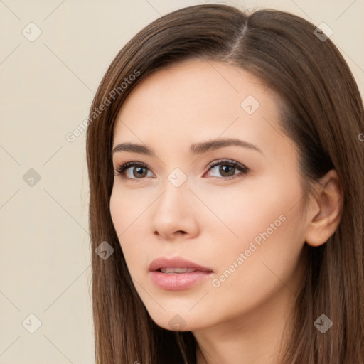 Neutral white young-adult female with long  brown hair and brown eyes