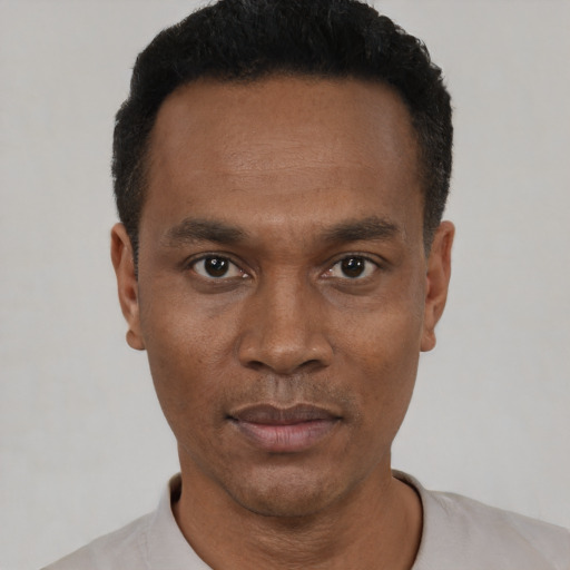 Neutral black young-adult male with short  black hair and brown eyes