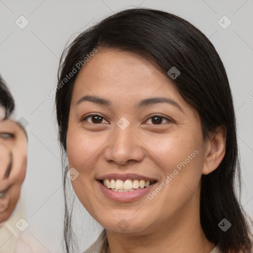 Joyful white young-adult female with medium  brown hair and brown eyes