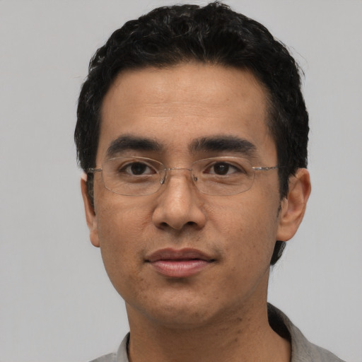 Neutral asian adult male with short  black hair and brown eyes