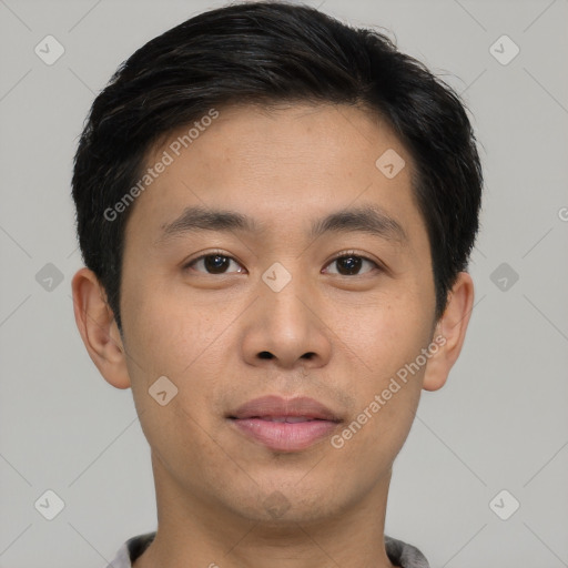 Joyful asian young-adult male with short  brown hair and brown eyes