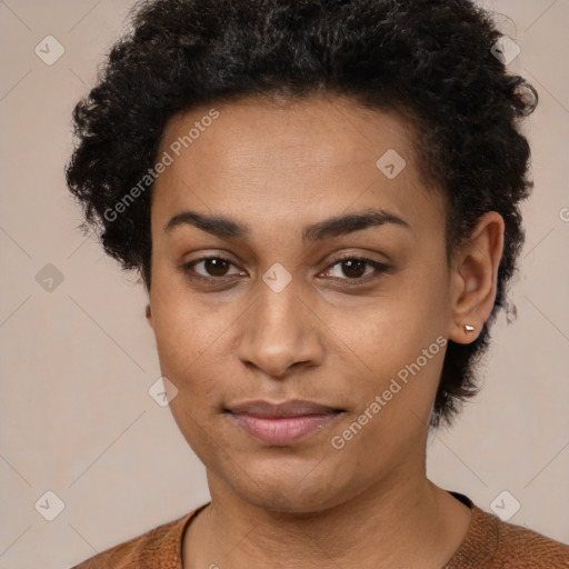 Joyful black young-adult female with short  brown hair and brown eyes