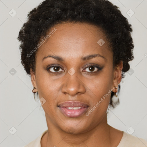 Joyful black young-adult female with short  brown hair and brown eyes
