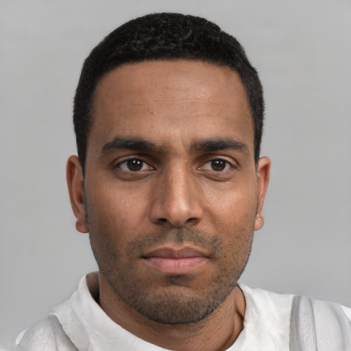 Neutral white young-adult male with short  black hair and brown eyes