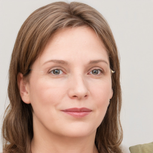 Neutral white young-adult female with medium  brown hair and grey eyes