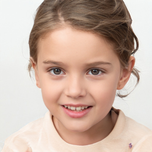 Joyful white child female with medium  brown hair and brown eyes