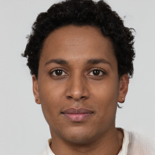 Neutral black young-adult female with short  brown hair and brown eyes